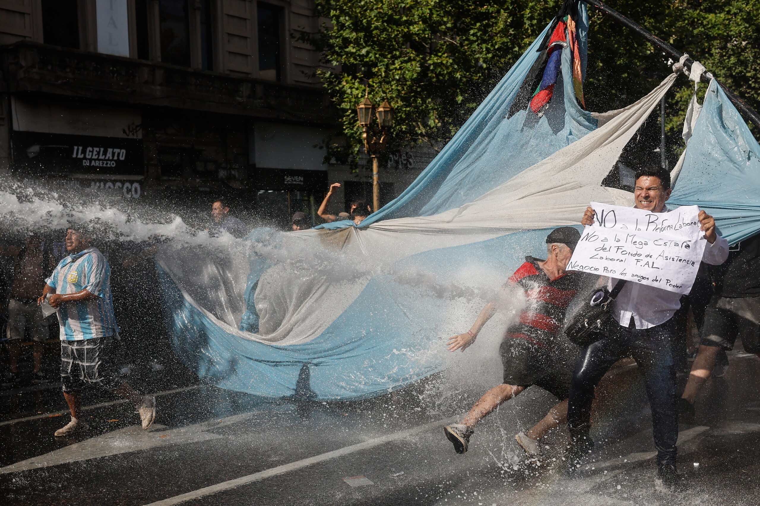Protesters clash with police during a demonstration against labor reform proposed by Argentine President Javier Milei in Buenos Aires, Argentina, 19 February 2026.
