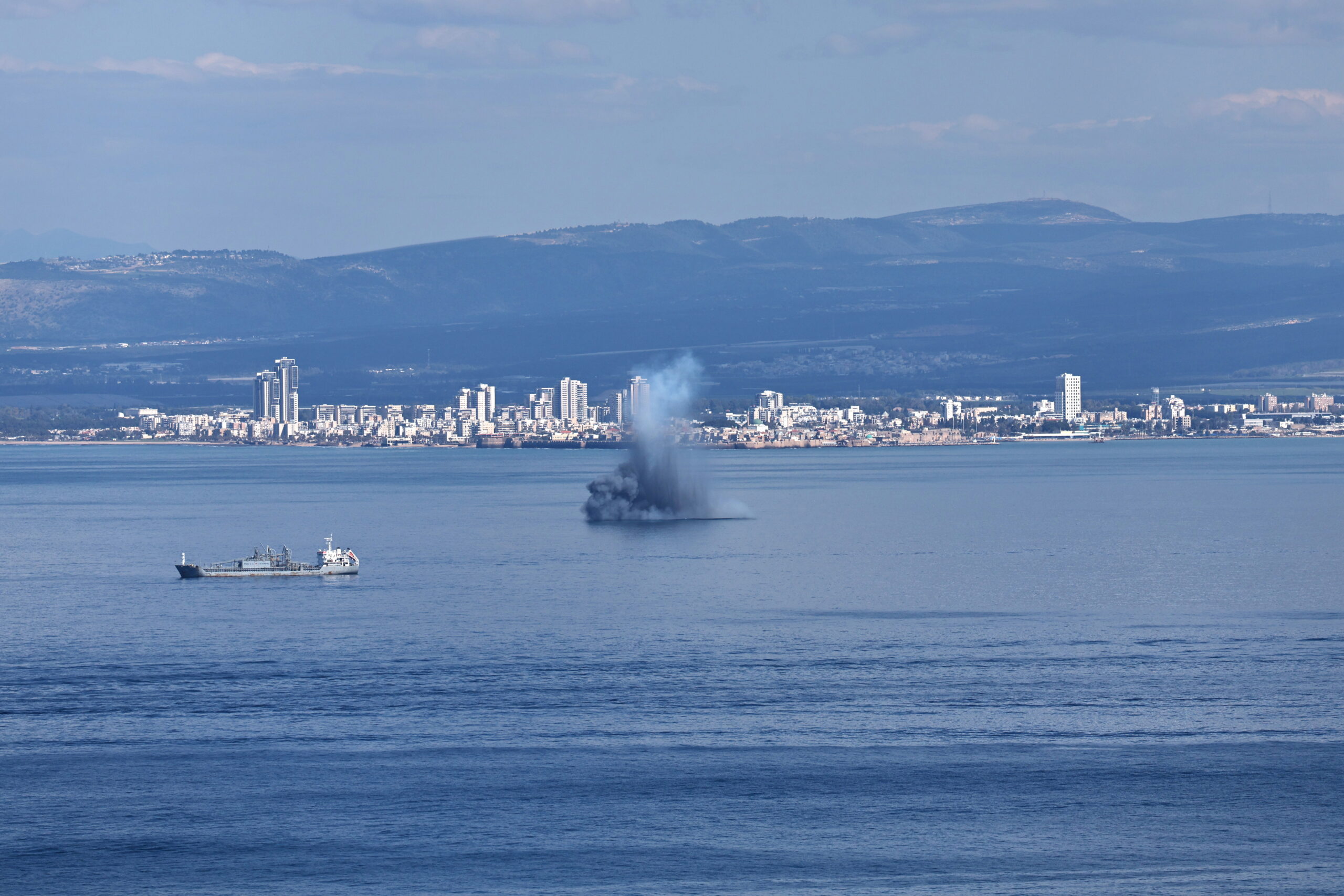 Smoke rises as an Iranian missile hit in the sea in the Mediterranean city of Haifa, Israel, 28 February 2026. The Israeli military reported on 28 February it deteced missiles launched from Iran following earlier Israeli and US strikes. Sirens were activated across several parts of the country in response.