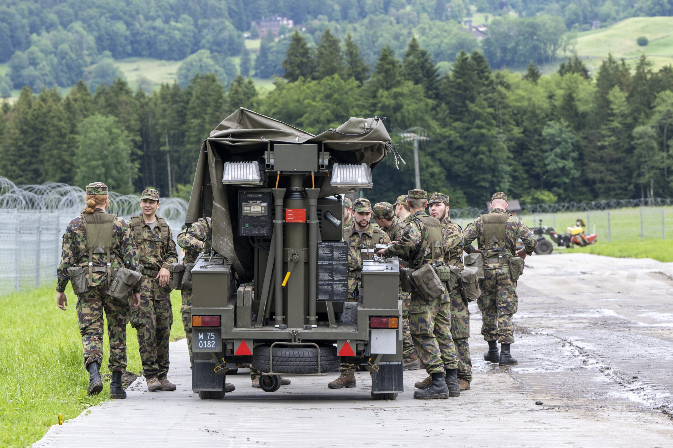 Swiss Army soldiers set up the helicopter base during a media tour of the security precautions of the Nidwalden cantonal police and the Swiss Army at the Obbuergen area in the municipality of Stansstad, in the canton of Nidwalden, below the Buergenstock Resort, Switzerland, 10 June 2024. A Ukraine peace conference with over 90 delegations from all over the world will take place at the Buergenstock resort on 15 and 16 June.