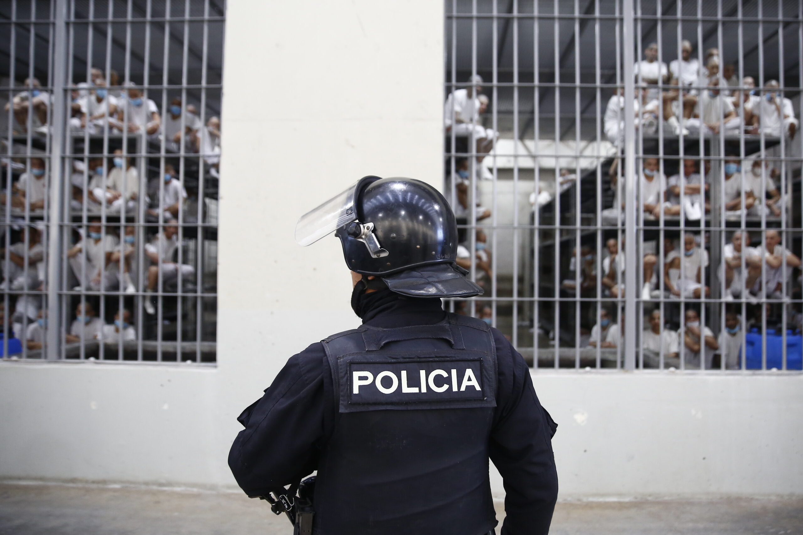 A member of the Order Maintenance Unit (UMO), a specialized force of the National Civil Police (PNC) of El Salvador, guards inmates during a visit of Chilean president-elect Jose Antonio Kast (not pictured) to the Terrorism Confinement Center (Cecot) maximum-security prison in San Salvador, El Salvador, 30 January 2026. Kast is in El Salvador to tour the Cecot and hold a private meeting with Salvadoran President Bukele.