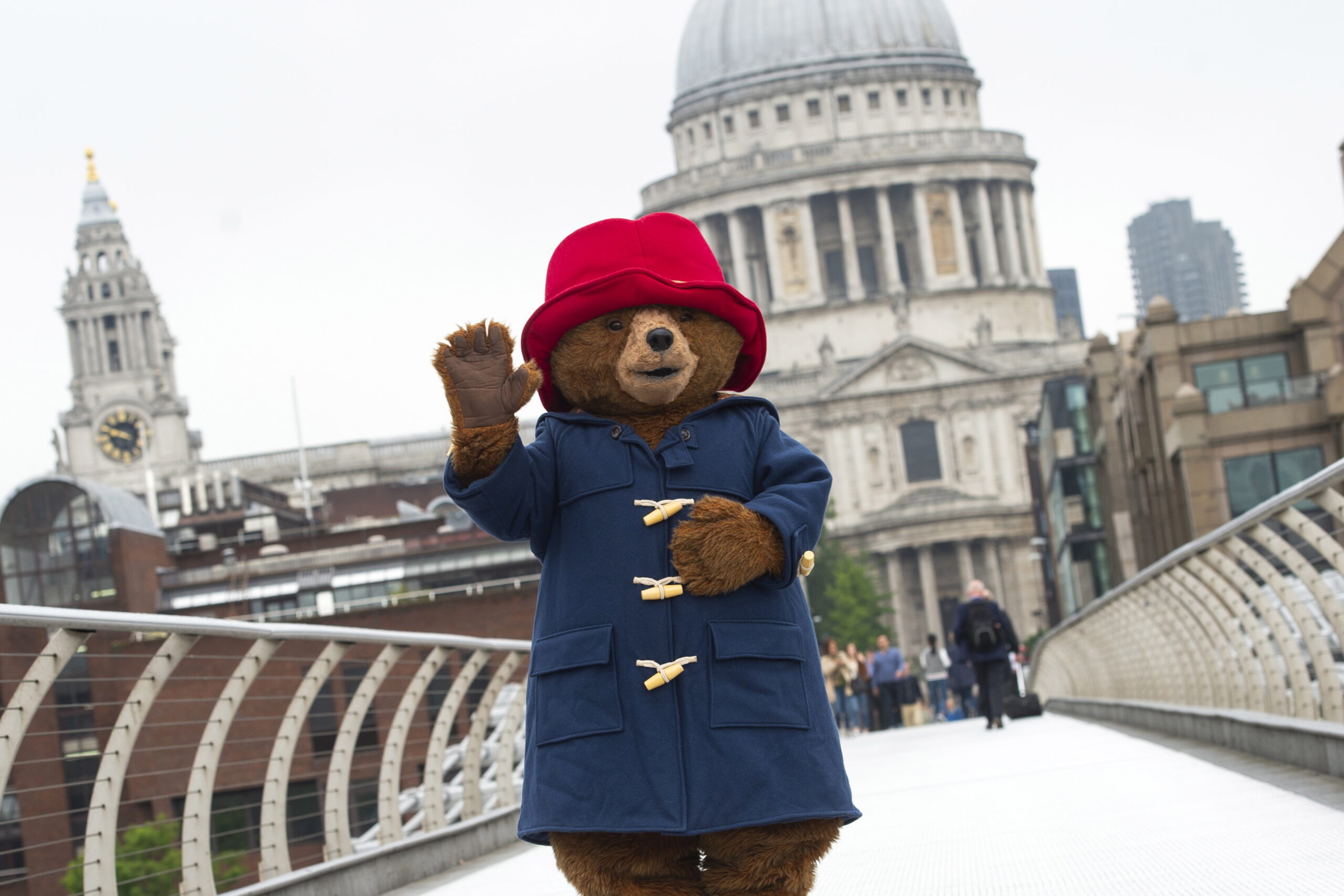 Paddington Bear poses for photographs on Millennium Bridge in front of St Paul's Cathedral in Central London, Britain, 30 May 2018. The photocall marked the launch of late British author Michael Bond's final book, titled Paddington at St Paul's'.