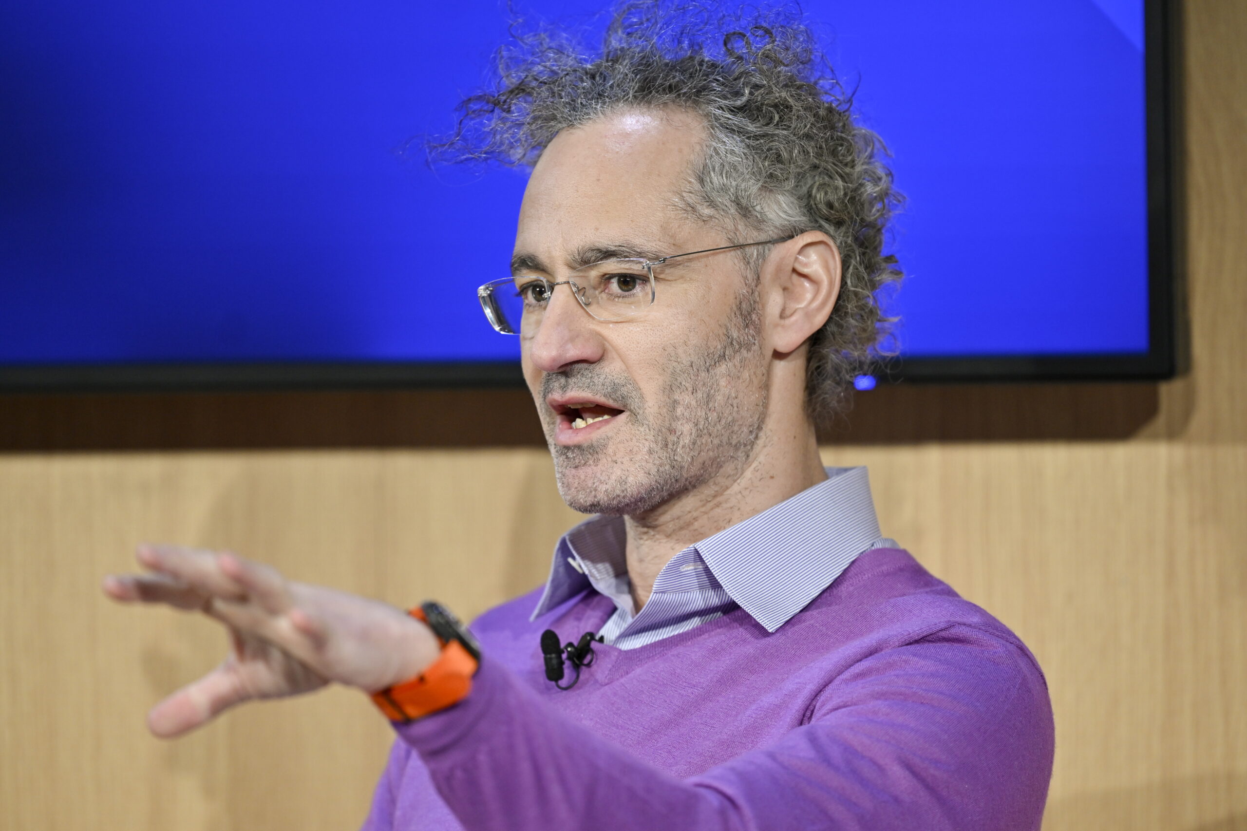 Alex Karp, CEO of Palantir, addresses a panel session during the 53rd annual meeting of the World Economic Forum (WEF) in Davos,