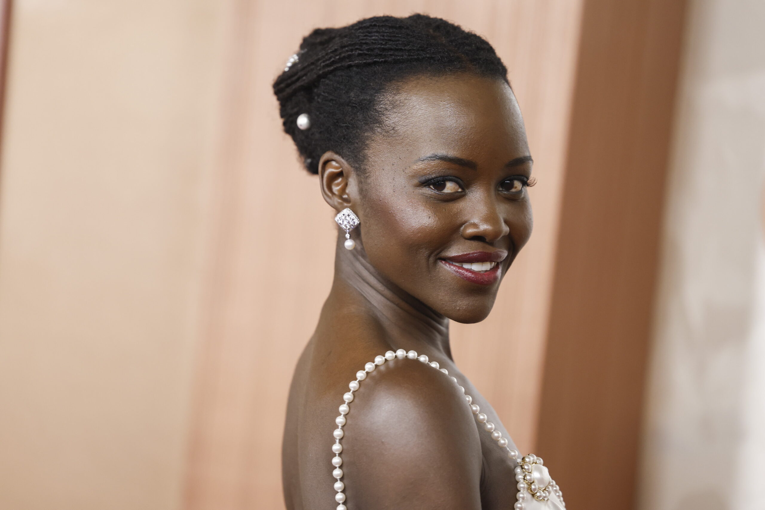 Kenyan-Mexican actor Lupita Nyong'o arrives on the red carpet during the 97th annual Academy Awards ceremony at the Dolby Theatre in the Hollywood neighborhood of Los Angeles, California, USA, 02 March 2025.