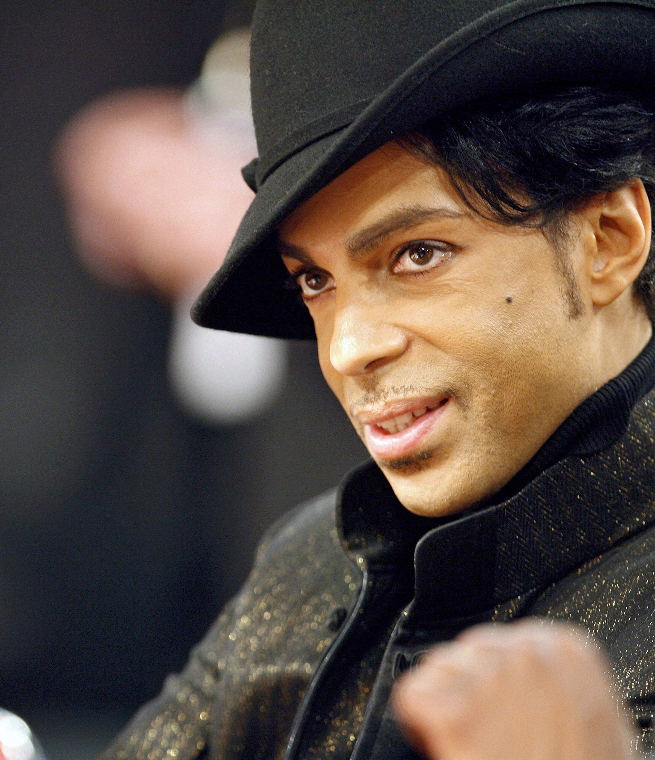 A file picture dated 18 February 2007 shows US musician Prince watching the NBA All-Star game in Las Vegas, Nevada, USA (reissued 25 August 2018). Officials on 02 June 2016 announced that Prince died from an accidental overdose of the synthetic opiate fentanyl. The singer's family sued his doctor alleging he failed to properly treat the singer for an opioid addiction, according to media reports on 25 August 2018. The legendary musician died on 21 April 2016 at his Paisley Park residence in Minnesota, USA, at the age of 57.