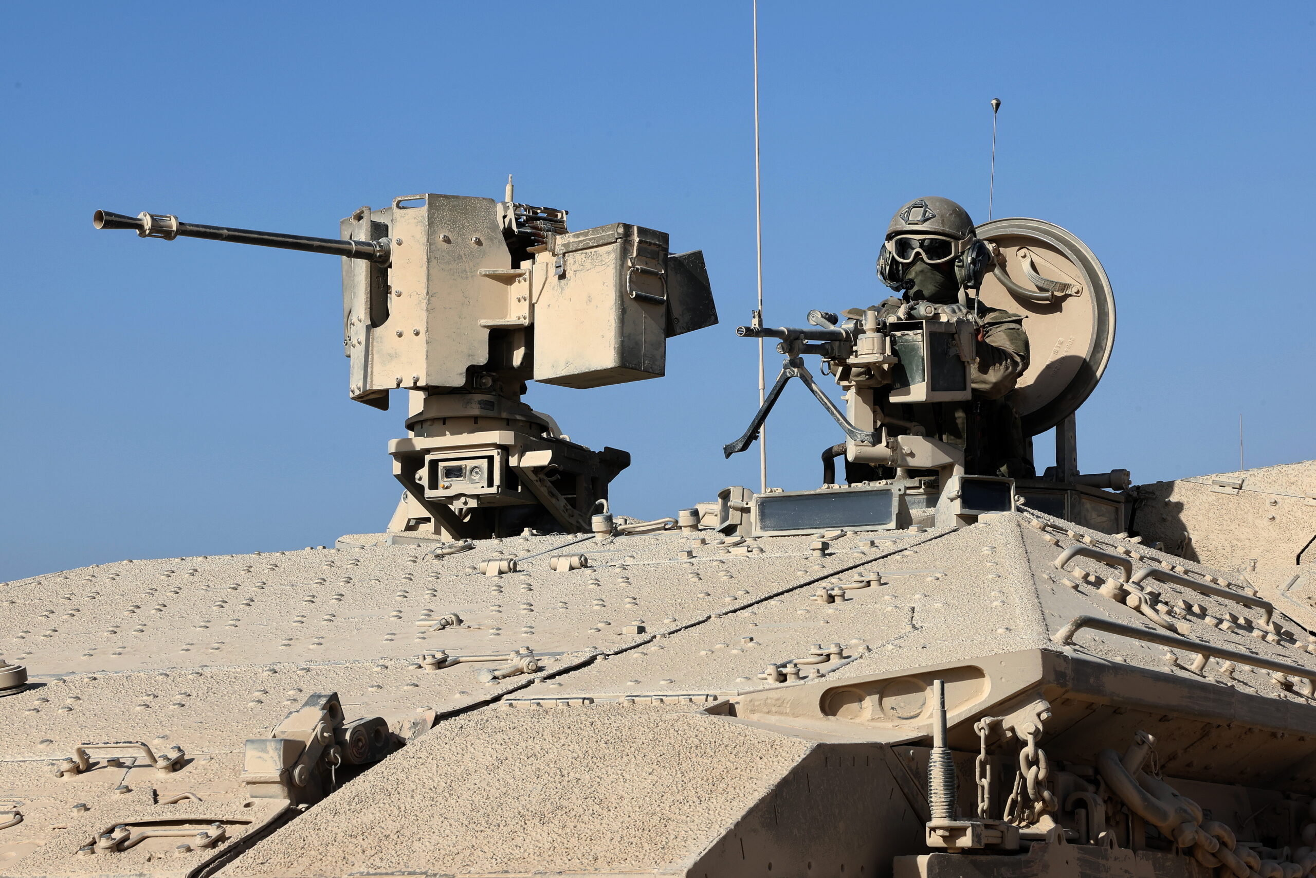 A photo taken while embedded with the Israeli Army and cleared by Israeli military censors shows an Israeli army soldier behind a mounted machine gun in the vicinity of the Jordanian Field Hospital in Gaza City, 03 October 2025 (issued 04 October 2025). Israel's military said on 04 October to advance readiness for the implementation of the first phase of the Trump plan for the release of the hostages while the same time make the safety of IDF troops a top priority and allocate all IDF capabilities to the Southern Command to ensure the protection of the troops.