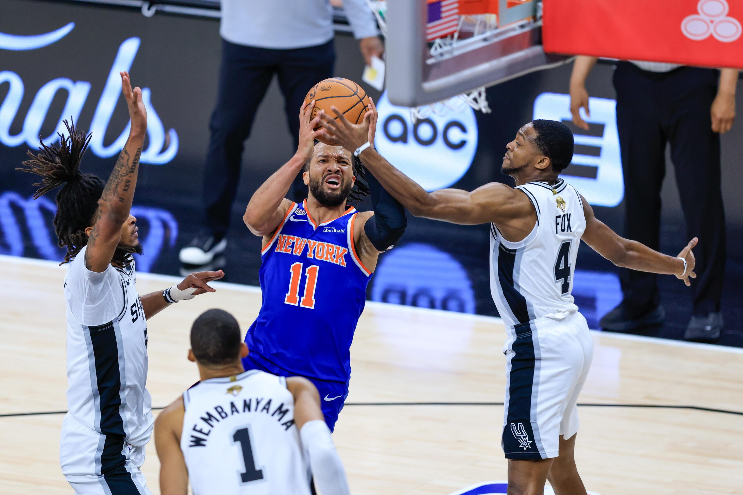 New York Knicks guard Jalen Brunson (C) takes a shot in between San Antonio Spurs guard Stephon Castle (L), San Antonio Spurs forward Victor Wembanyama (2-L) and San Antonio Spurs guard De'Aaron Fox (R) during Game 2 of the NBA Finals between the San Antonio Spurs and the New York Knicks in San Antonio, Texas, USA, 05 June 2026.