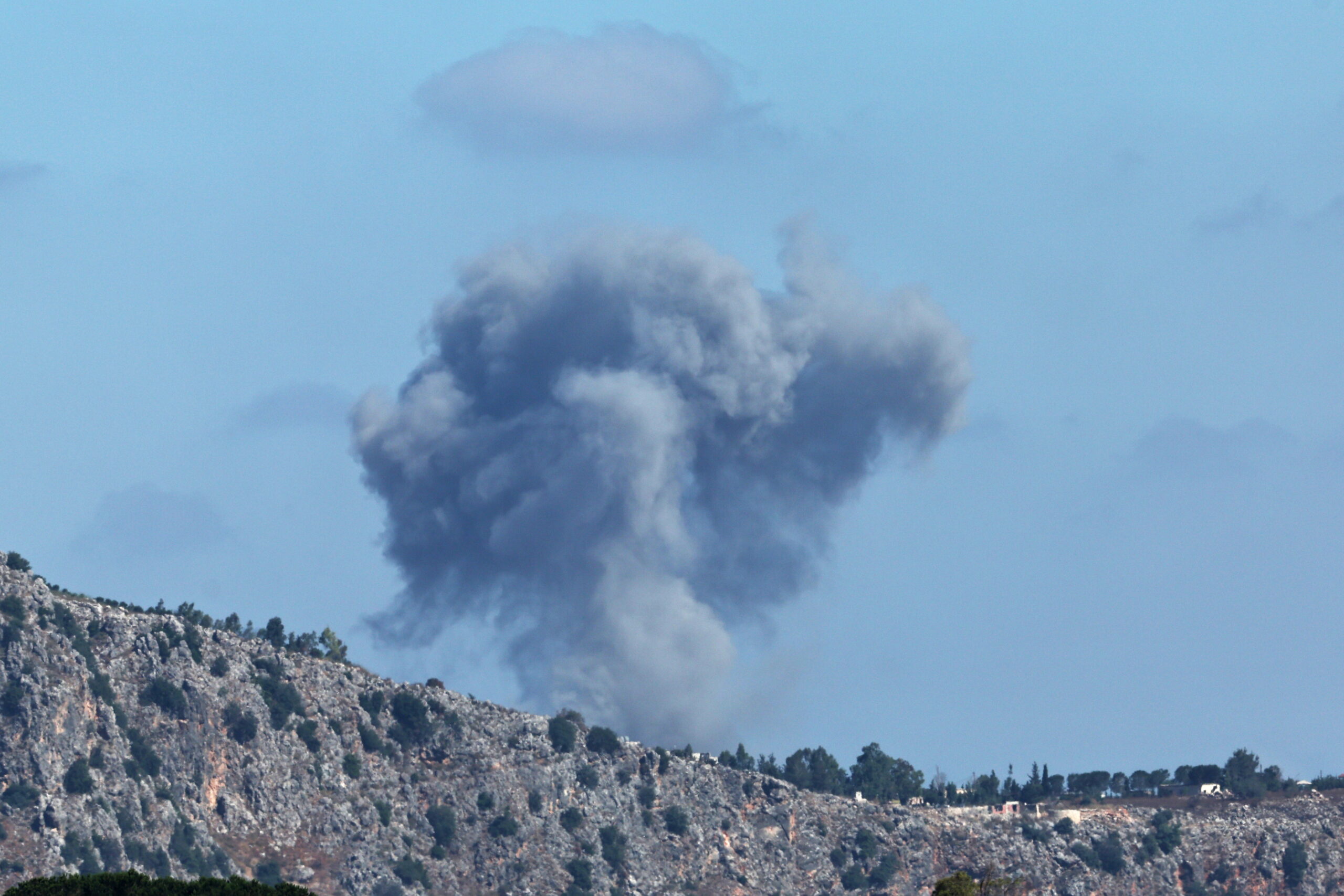 Smoke rises following an Israeli airstrike in southern Lebanon, as seen from the Israeli side of the border in the Upper Galilee, northern Israel, 19 June 2026. The Israel Defense Forces (IDF) carried out multiple airstrikes targeting infrastructure sites across southern Lebanon overnight following what it described as repeated ceasefire violations by Hezbollah, according to an IDF spokesperson.