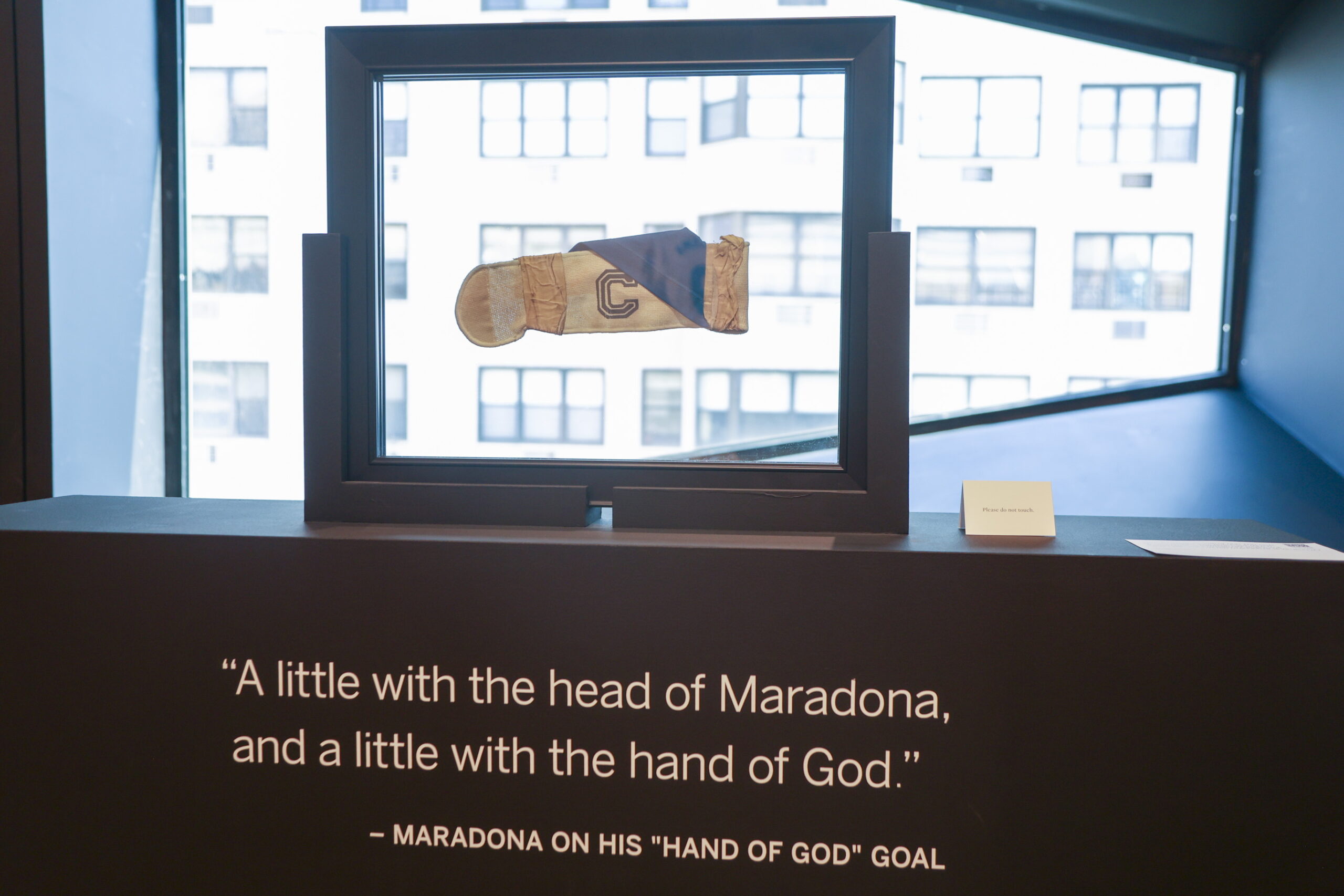epa13078108 The captain's armband worn by Argentine soccer player Diego Maradona during the 1986 FIFA World Cup match featuring the 'Hand of God' and 'Goal of the Century' is displayed at the Sotheby's auction house in New York, New York, USA, 01 July 2026.