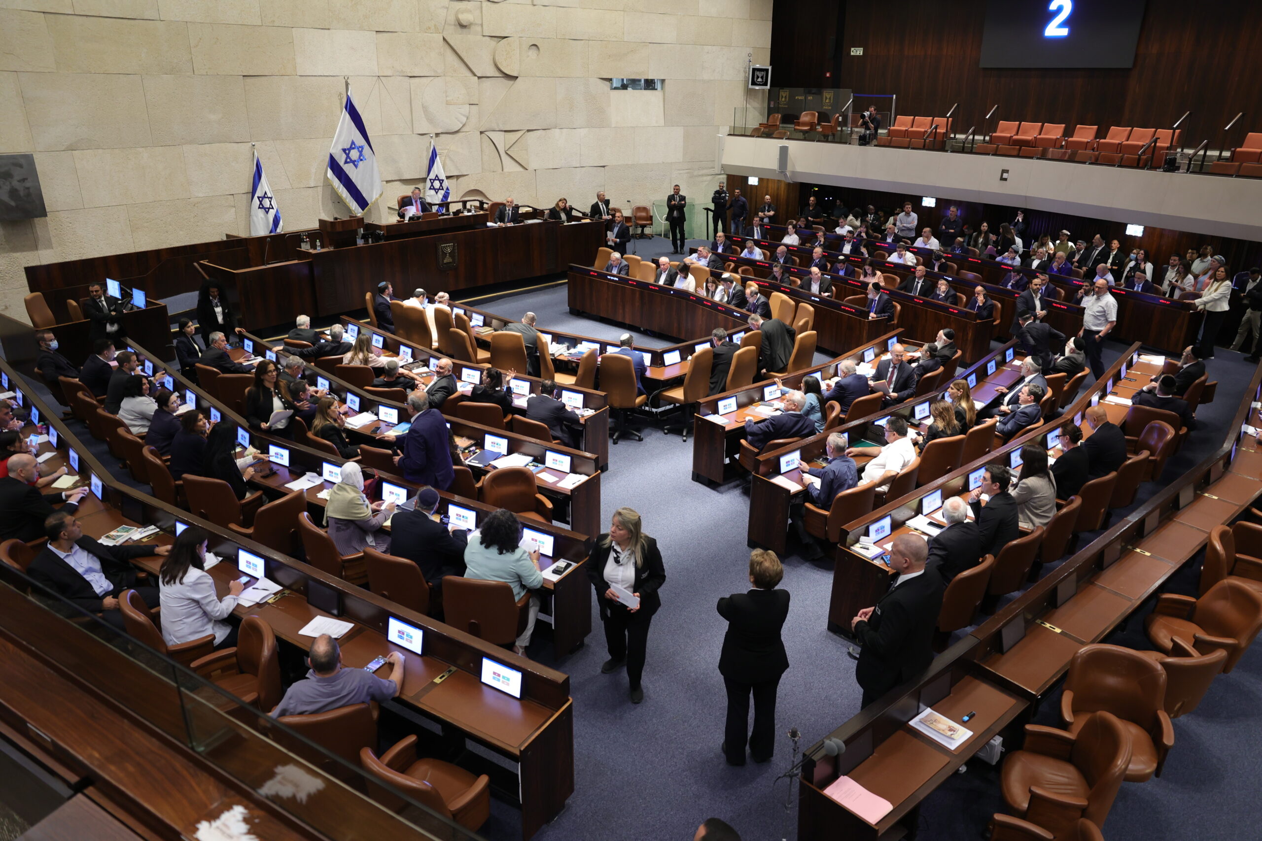 Knesset members vote on the Basic Law proposal, 'Torah Study,' at the Knesset, Israel's parliament, in Jerusalem, 13 July 2026.