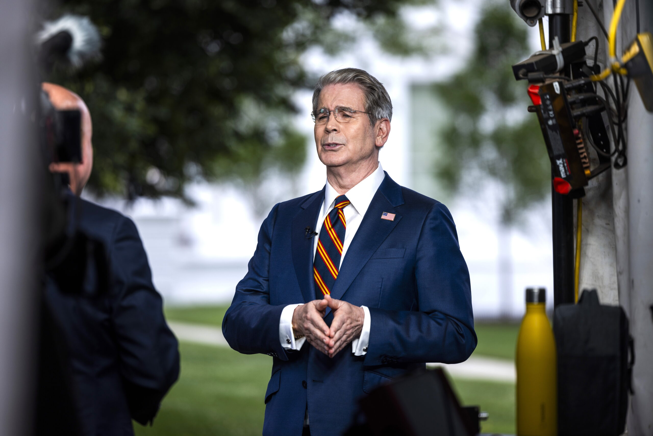 epa13142819 US Treasury Secretary Scott Bessent speaks in a TV interview outside the White House in Washington, DC, USA, 30 July 2026.