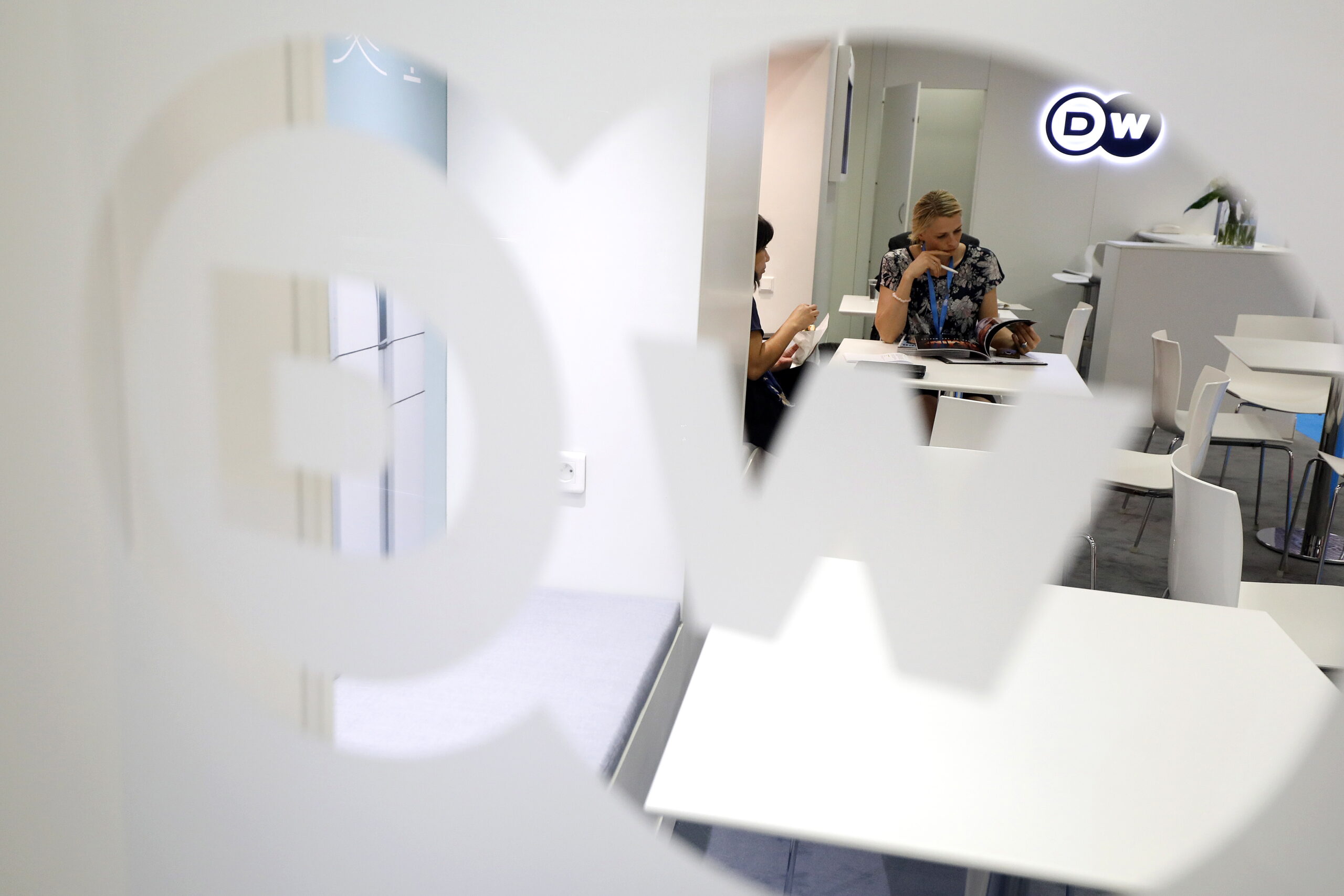epa07095445 People speak during a meeting at the office of German media company DW Deutsche Welle office during at the annual MIPCOM - The World's Entertainment Content Market in Cannes, France, 15 October 2018. The media event runs from 15 to 18 October.