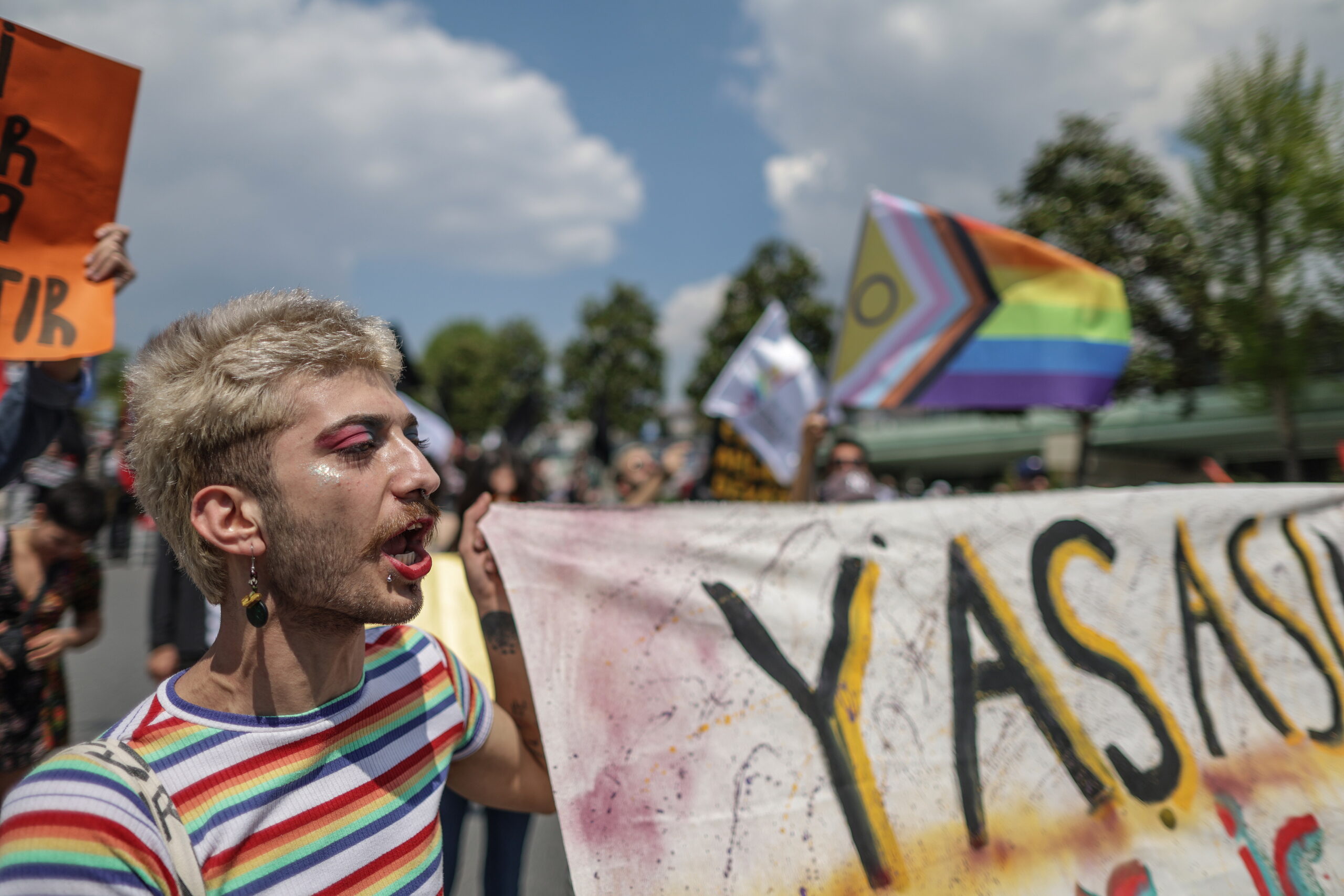 epa10601913 LGBTQ activists hold placards and shout slogans during a May Day celebration rally in Istanbul, Turkey, 01 May 2023. International Workers' Day is an annual holiday that takes place on 01 May and celebrates workers, their rights, achievements and contributions to society.