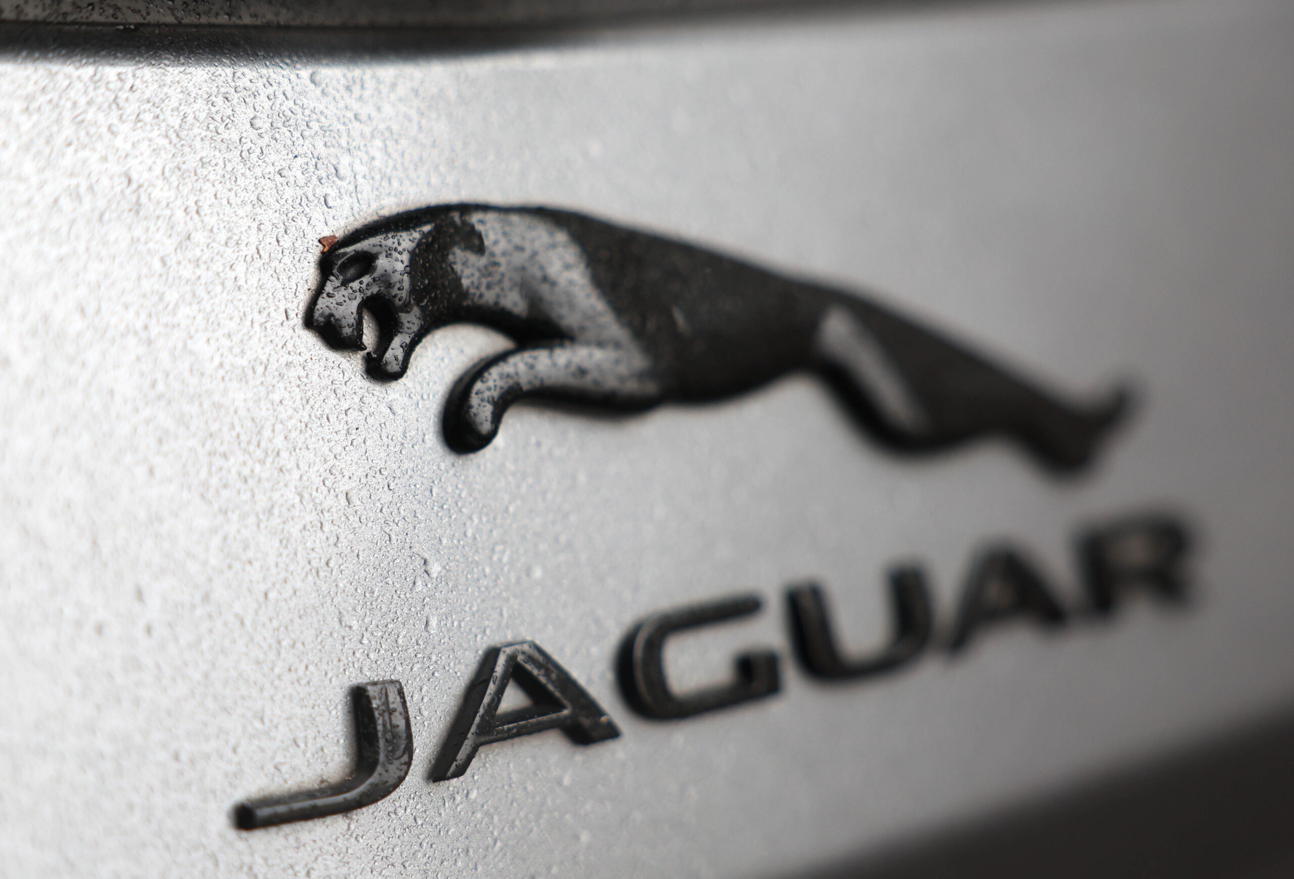 epa12413188 A Jaguar car badge in London, Britain, 28 September 2025. The UK government has agreed to underwrite a 1.5bn British Pounds loan guarantee to Jaguar Land Rover (JLR) after a cyber-attack continues to halt production at the car maker. The manufacturer suspended production for weeks after being targeted by hackers at the end of August. 30,000 people are employed at the company's UK plants with another 100,000 working for firms in the supply chain