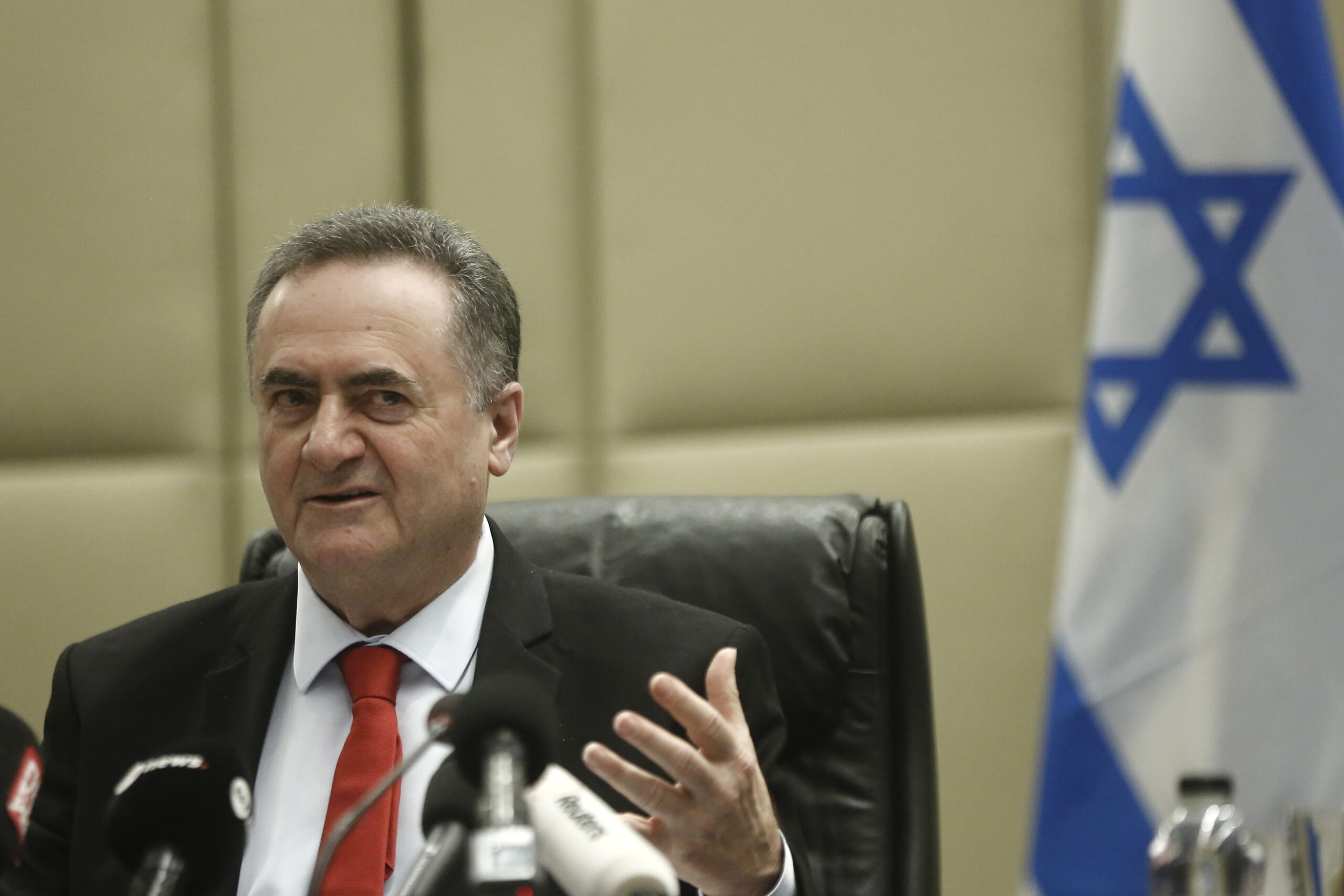 epa12663771 Israel's Minister of Defense Israel Katz talks to Greece's defense minister during their meeting in Athens, Greece, 20 January 2026.