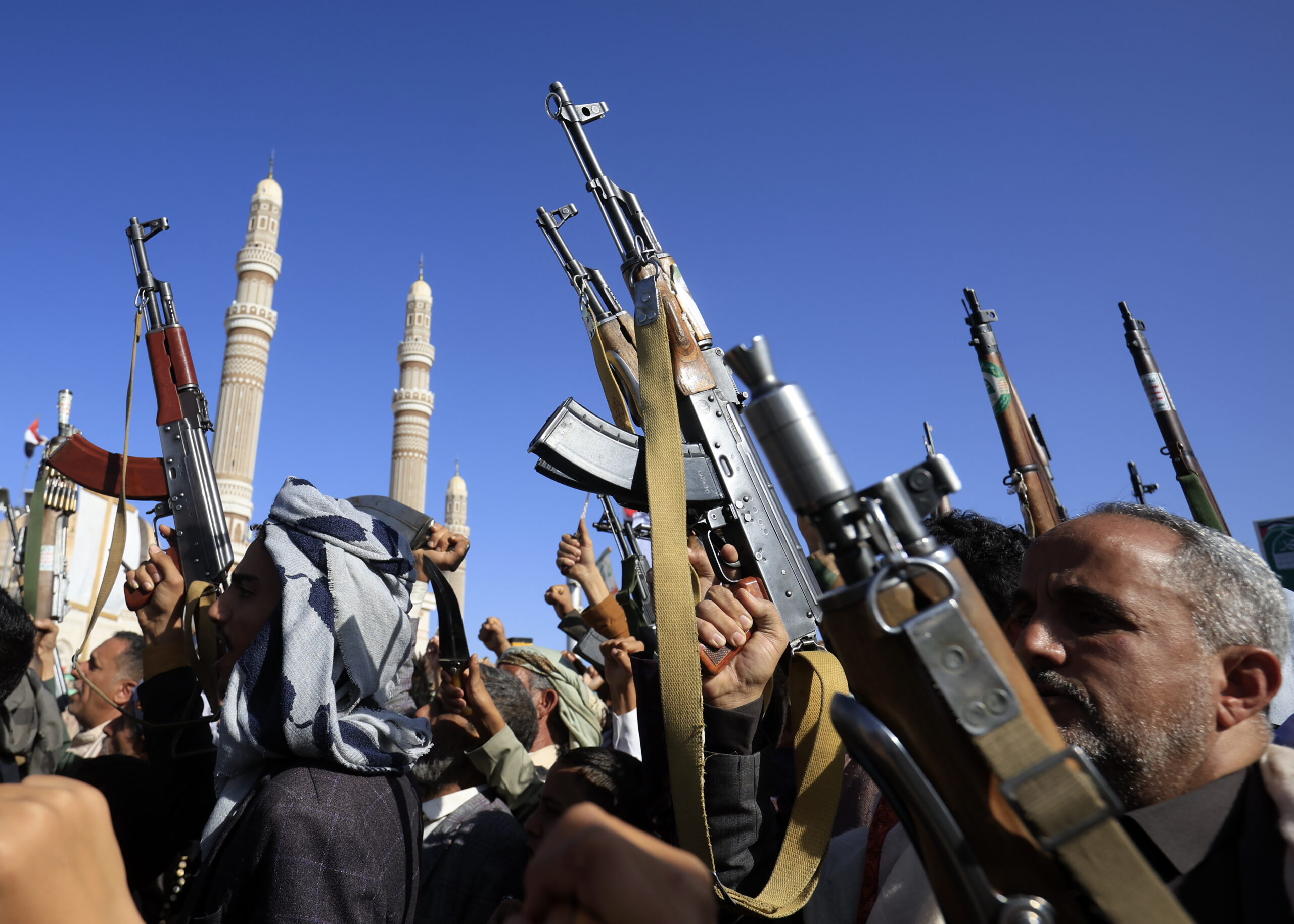 epa13292237 Houthi supporters hold up weapons during a protest against Saudi Arabia, in Sana'a, Yemen, 09 October 2026. Thousands of Houthi supporters rallied in Sana'a to protest against Saudi Arabia amid an escalation in fighting after Yemen's Saudi-backed government announced a military campaign on 04 October to retake Houthi-held territory.