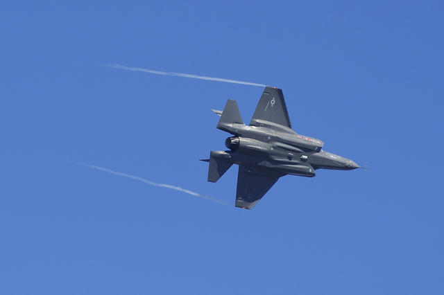 An F-35 Lightning II maneuvers during its first flight over Eglin Air Force Base, Fla., April 23, 2009. The jet is a fifth generation, single engine, stealth-capable strike fighter and can perform close air support, tactical bombing and air defense missions. (U.S. Air Force photo by Senior Airman Julianne Showalter/Released)