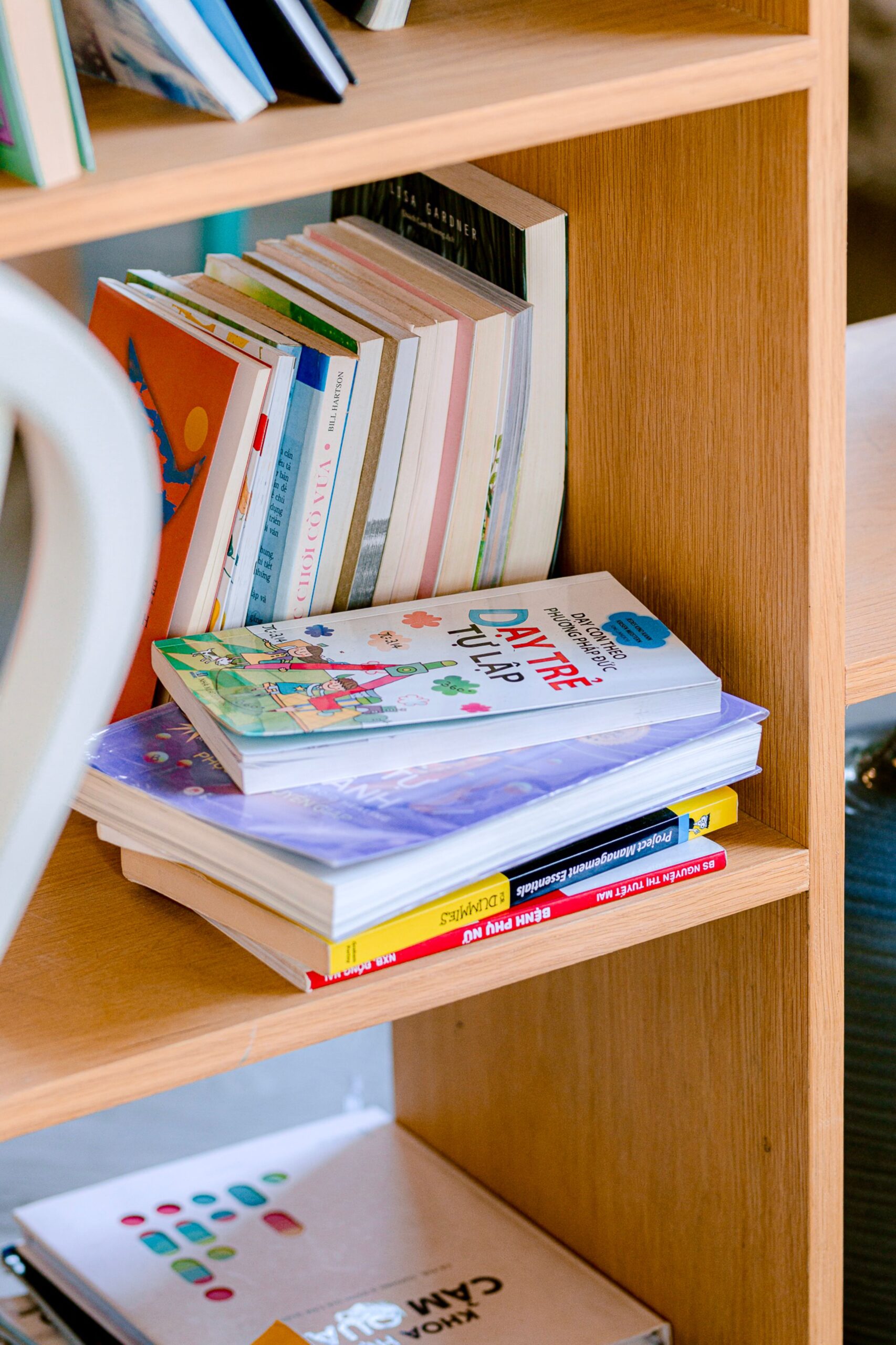 A vibrant bookshelf filled with children's books and educational materials.